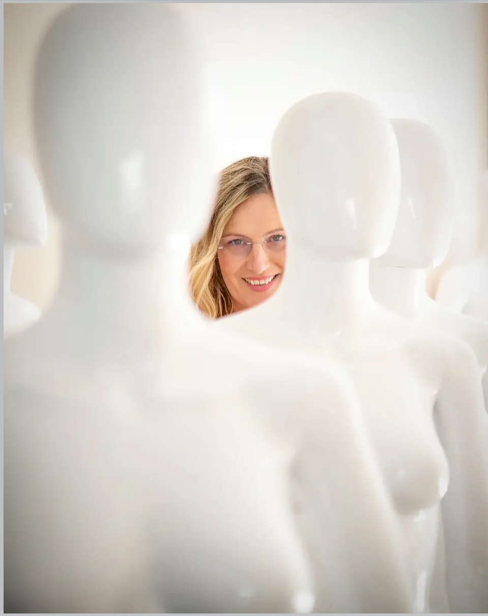 Ella Dusevic among white mannequins